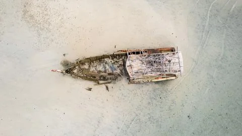 A wreck ship on the sand Stock Photos