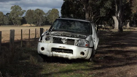A wrecked Abandoned vehicle Stock Footage 242646680
