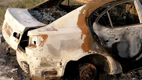Wrecked car after an explosion or severe fire. Stock Footage 121747916