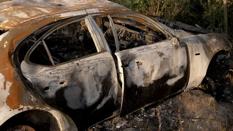 Wrecked car after an explosion or severe fire. Stock Footage 121747961
