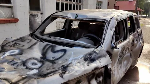 Wrecked Car Beaten With a Hammer Stock Footage 206497611