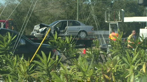 Wrecked Car On Flatbed Tow Truck Stock Footage