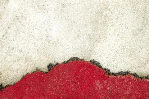 Wrecked red rubber pavement Stock Photos