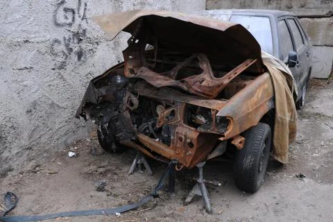 Wrecked rusty car Stock Photos