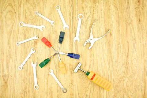 Wrench hammer and small screwdriver Stock Photos