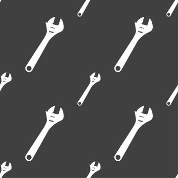 Wrench icon sign. Seamless pattern on a gray background. イラスト素材