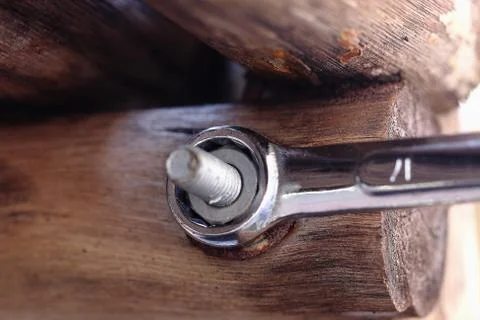 Wrench tighten the nut on use Stock Photos