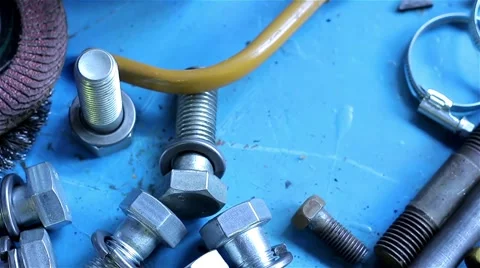 Wrenches and bolts on table close up Stock Footage 55952240