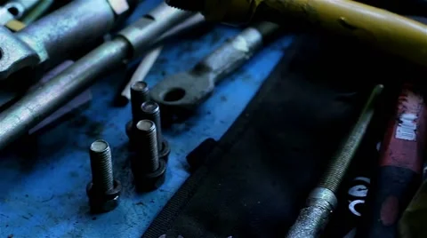 Wrenches and bolts on table close up Stock Footage 55953091