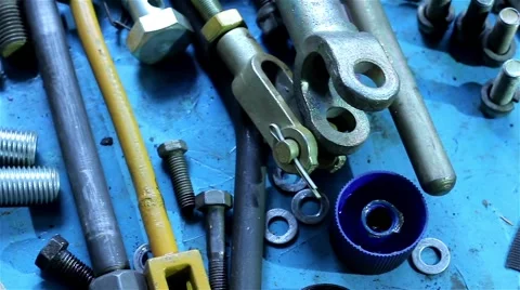 Wrenches and bolts on table close up Stock Footage 55953537