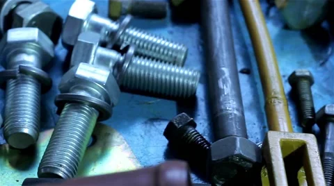 Wrenches and bolts on table close up Stock Footage 55953958