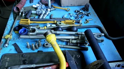 Wrenches and bolts on table close up Stock Footage 55955072