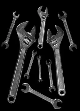 Wrenches on a black background Stock Photos