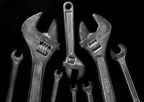 Wrenches on a black background Stock Photos