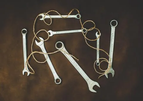 Wrenches on a brown background Stock Photos