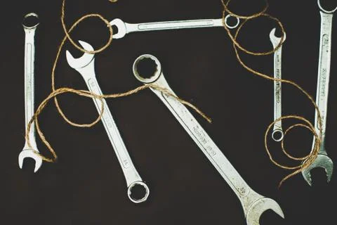 Wrenches on a brown background Stock Photos