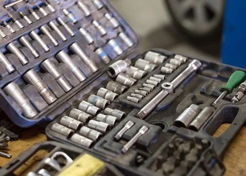 Wrenches for car repairs. Auto mechanic working in garage. Repair service. Stock Photos