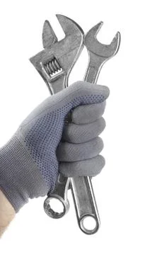 Wrenches in hand Stock Photos