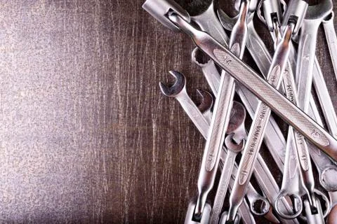 Wrenches on a metal background Stock Photos