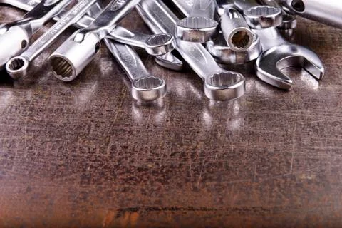 Wrenches on a metal background 스톡 사진