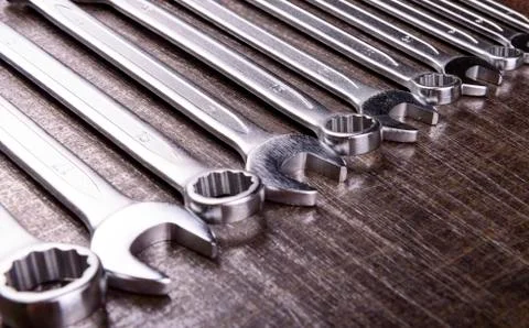 Wrenches on a metal background Stock Photos
