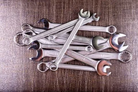 Wrenches on a metal background Stock Photos