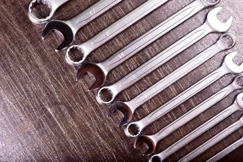 Wrenches on a metal background Stock Photos