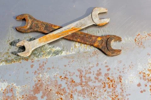 Wrenches on rusty metal Stock Photos