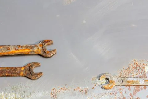 Wrenches on rusty metal Stock Photos