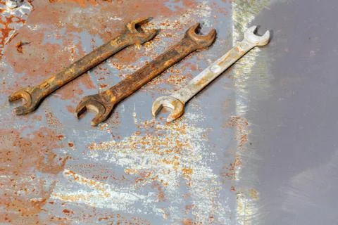 Wrenches on rusty metal Fotos Stock
