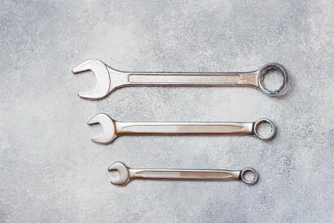 Wrenches, tools on gray concrete background with copy space. 스톡 사진