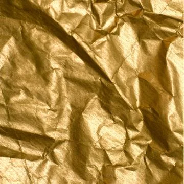 Wrinkled golden paper Stock Photos