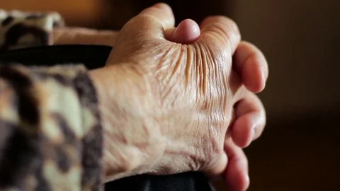 Wrinkled hands of an old man Stock Footage 80509407