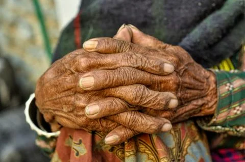Wrinkled hands Stock Photos
