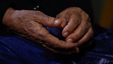 The Wrinkled Old Tired Hands Of An Elderly woman Stock Footage 256400229
