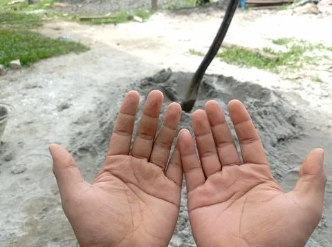 Wrinkly hands of construction workers. Stock Photos