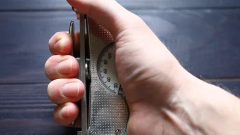 Wrist dynamometer in hand close up Stock Footage 124129894
