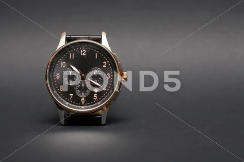 Wristwatch on dark Stock Photos