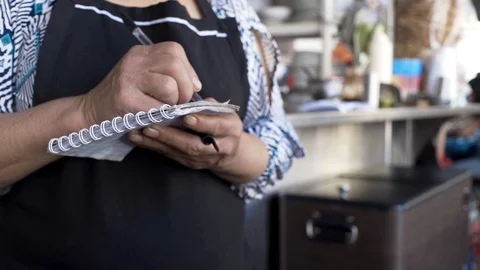 Write down the food order Stock Footage 125953420