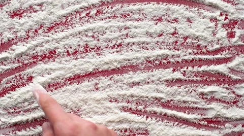 Write a finger I LOVE YOU on a white flour background. Stock Footage 62072726