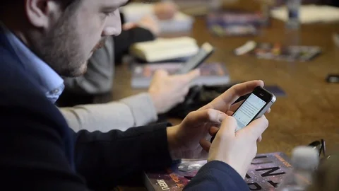 Write messages on the smartphone Stock Footage 88816969