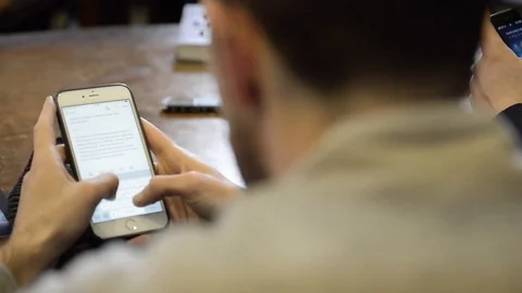 Write messages on the smartphone Stock Footage 88817018