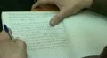 Write in notebook HD Footage