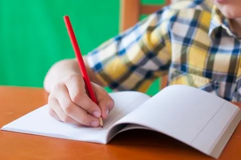 Write in a notebook Stock Photos