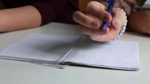 Write notes in the exercise book Stock Footage 71934455