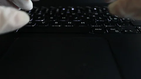 Write on the pc with sterile gloves Stock-Footage 127684084