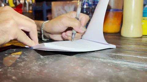 Write a purchase receipt Stock Footage 211167332