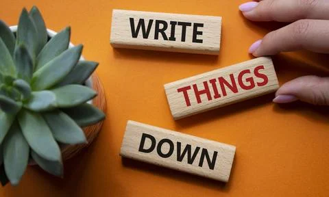 Write things down symbol. Concept words Write things down on wooden blocks... Stock Photos