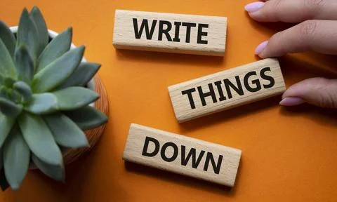 Write things down symbol. Concept words Write things down on wooden blocks... Stock Photos
