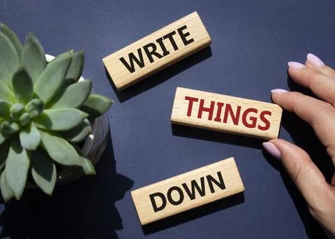 Write things down symbol. Concept words Write things down on wooden blocks. B Stock Photos